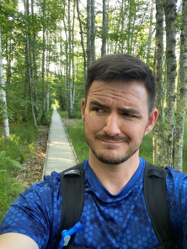 silly face on Jessup Path. Jessup Path has a long wooden boardwalk through a birch forest at the edge or Dorr Mountain and Great Meadow. The wind always makes the leaves sing here. One of Acadia Driving Tours' favorite places to share with guests.